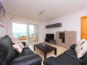 A seating area at Apartment Blanes Playa by Interhome