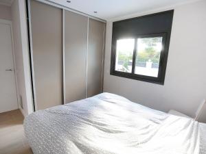 Posteľ alebo postele v izbe v ubytovaní Holiday Home Gunella by Interhome