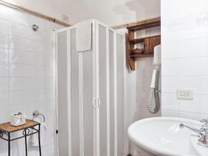 A bathroom at Apartment Chiantishire retreat-1 by Interhome