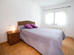 Łóżko lub łóżka w pokoju w obiekcie Holiday Home Junio by Interhome