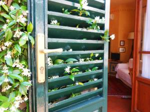A bed or beds in a room at Poggio Imperiale Apartments