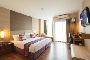 TV a/nebo společenská místnost v ubytování Marsi Hotel Bangkok