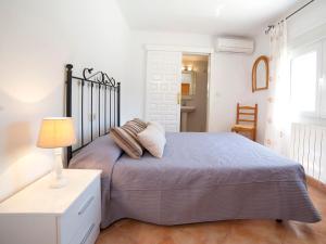 Ein Bett oder Betten in einem Zimmer der Unterkunft Villa Amber by Interhome