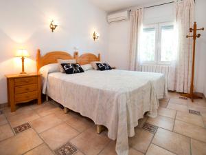 Ein Bett oder Betten in einem Zimmer der Unterkunft Villa Amber by Interhome
