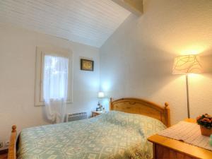 Ένα ή περισσότερα κρεβάτια σε δωμάτιο στο Holiday Home Paradise Océan-11 by Interhome