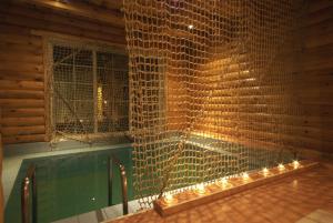a swimming pool with a bunch of lights around it at Külalistemaja Vehendi Motell in Vehendi