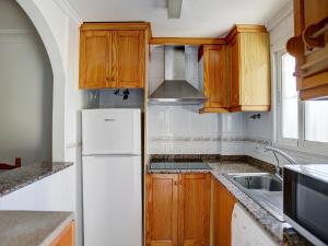 Η κουζίνα ή μικρή κουζίνα στο Apartment Residencial Daly by Interhome +12 φωτογραφίες