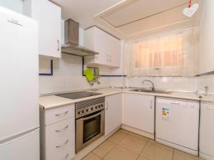 A kitchen or kitchenette at Apartment El Bosque by Interhome