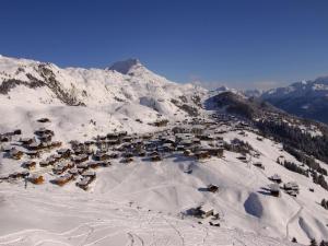 a small village in the snow on a mountain at Apartment Almenrausch Parterre by Interhome in Riederalp