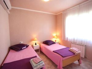 Posteľ alebo postele v izbe v ubytovaní Villa Escorpion by Interhome + 8 fotografií