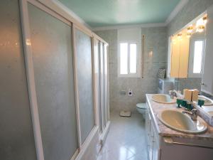 A bathroom at Villa Escorpion by Interhome