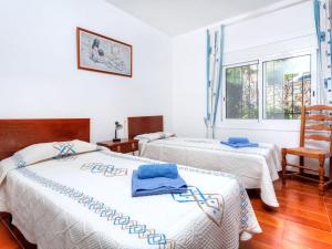 Postel nebo postele na pokoji v ubytování Holiday Home Mirador by Interhome