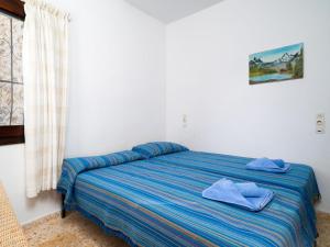 Postel nebo postele na pokoji v ubytování Holiday Home Sunshine by Interhome