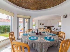 a dining room with a table and chairs at Villa Arribas Villa by Interhome in Patroves
