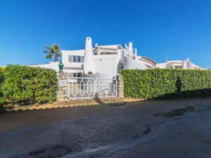 a white house with a fence in front of it at Villa Arribas Villa by Interhome in Patroves