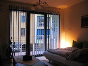 Postel nebo postele na pokoji v ubytování Mandarin Wellness Apartman
