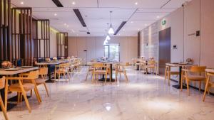 Restoran ili drugo mesto za obedovanje u objektu Paco Hotel Tiyuxilu Metro Guangzhou-Free Shuttle Bus during Canton Fair