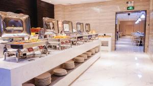 Restoran ili drugo mesto za obedovanje u objektu Paco Hotel Tiyuxilu Metro Guangzhou-Free Shuttle Bus during Canton Fair