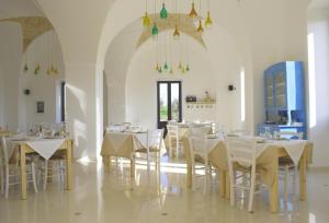 A restaurant or other place to eat at Masseria Galatea Agriturismo