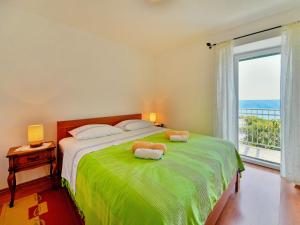 Posteľ alebo postele v izbe v ubytovaní Holiday Home Bruna by Interhome