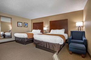Voodi või voodid majutusasutuse Comfort Inn N Myrtle Beach Barefoot Landing toas +20 fotot