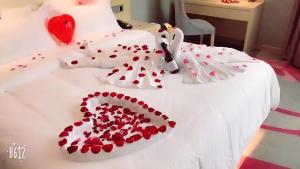 Ліжко або ліжка в номері Lavande Hotel Shanghai Jiading Xincheng Stadium Branch