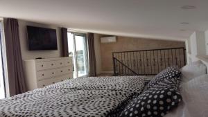 Posteľ alebo postele v izbe v ubytovaní Villa Perla Dalmatica