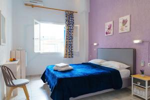 Postel nebo postele na pokoji v ubytování Argyro Rent Rooms