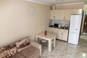 Kuchyň nebo kuchyňský kout v ubytování Batumi Orbi Residence Lux