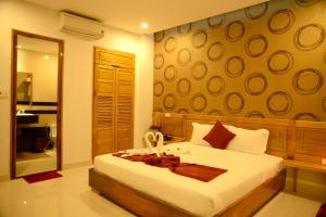 Letto o letti in una camera di Red Diamond Hotel