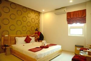 Letto o letti in una camera di Red Diamond Hotel