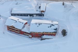 Obiekt Aparthotel Weningeralm zimą