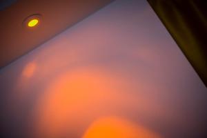a close up of a window with an orange object at Fior Apartments Lofts in Merano
