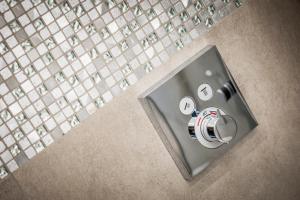 a bathroom stall with a toilet in the middle at Fior Apartments Lofts in Merano