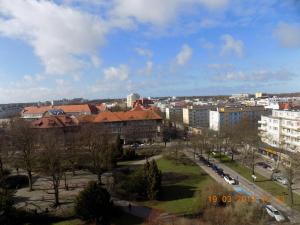 Výhľad na mesto Kołobrzeg alebo výhľad na mesto priamo z apartmánu + 4 fotografie