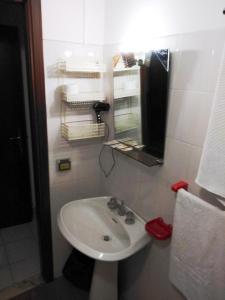 Koupelna v ubytování Hotel Eliseo