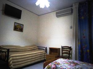 Postel nebo postele na pokoji v ubytování Hotel Eliseo