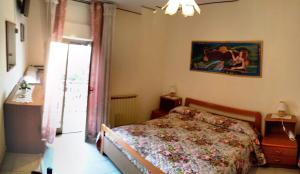 Postel nebo postele na pokoji v ubytování Hotel Eliseo