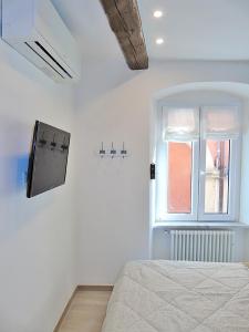 A bed or beds in a room at The Best View Of The Sea