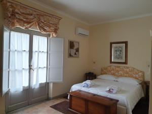 Postel nebo postele na pokoji v ubytování Hotel Terme di Stigliano