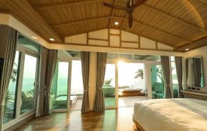 Postel nebo postele na pokoji v ubytování Kundala Beach Resort Hua Hin