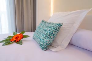 Postel nebo postele na pokoji v ubytování Gran Hotel Peñiscola