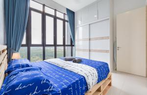 Postel nebo postele na pokoji v ubytování Legoland Fun- Hostahome Suites at D'Pristine Residence