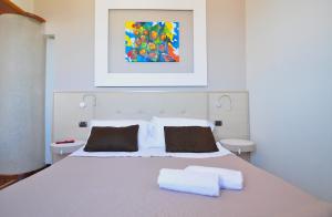 Posteľ alebo postele v izbe v ubytovaní Villa Cerniglia Plus