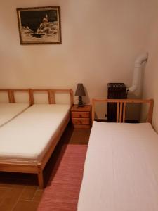 Postel nebo postele na pokoji v ubytování Folyóka Vendégház
