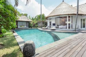 an image of a swimming pool in a villa at Villa Bliss a paradise of three independent Villas in Canggu