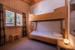 Postel nebo postele na pokoji v ubytování Chalet Aquila 7 Penthouse