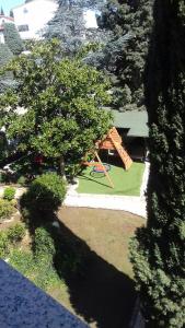 an overhead view of a park with a playground at Villa Verde Apartments and Rooms in Premantura