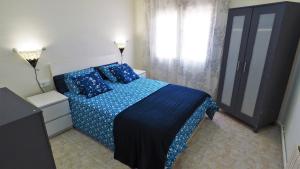 Posteľ alebo postele v izbe v ubytovaní MARILU SEAVIEW & BEACH - apartment