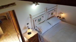 Cama ou camas em um quarto em Torre Mannella